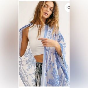 Excellent condition worn just 3 times Free People kimono in light blue